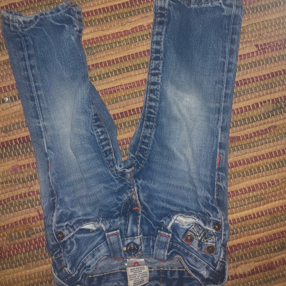 Boy tire religion jeans